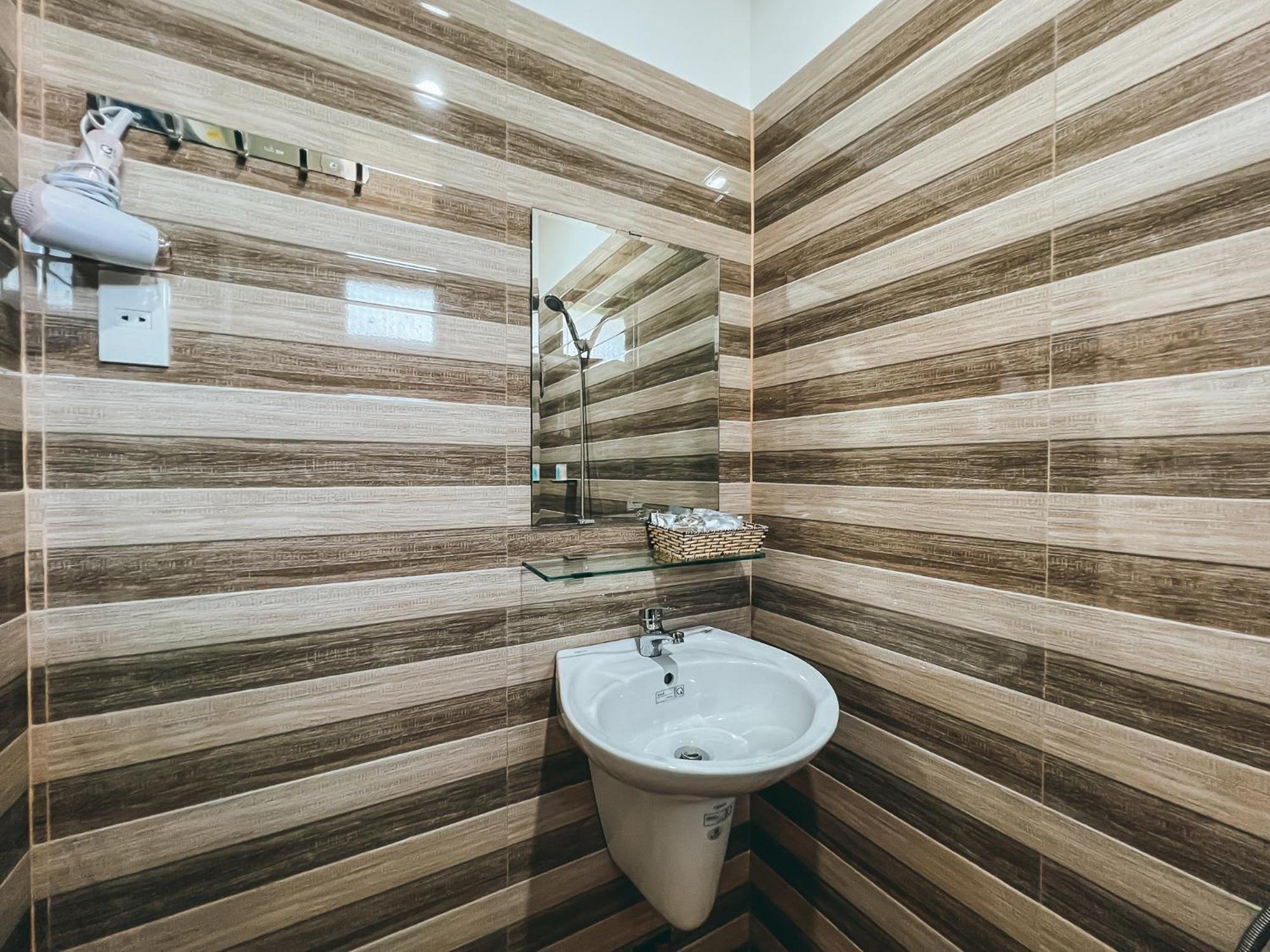 Bazan Home - Hotel & Bungalow Pleiku Rum bild