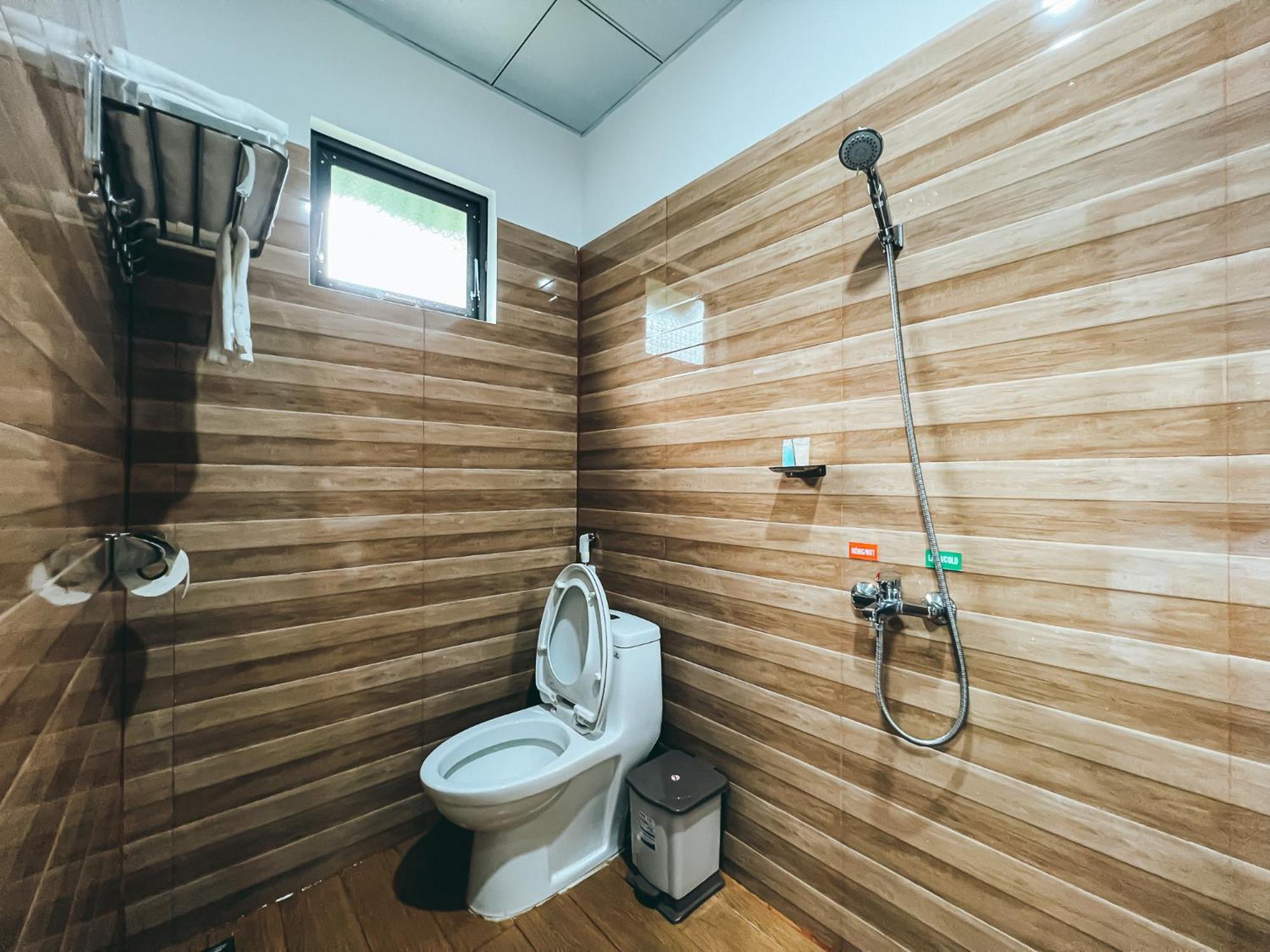 Bazan Home - Hotel & Bungalow Pleiku Rum bild