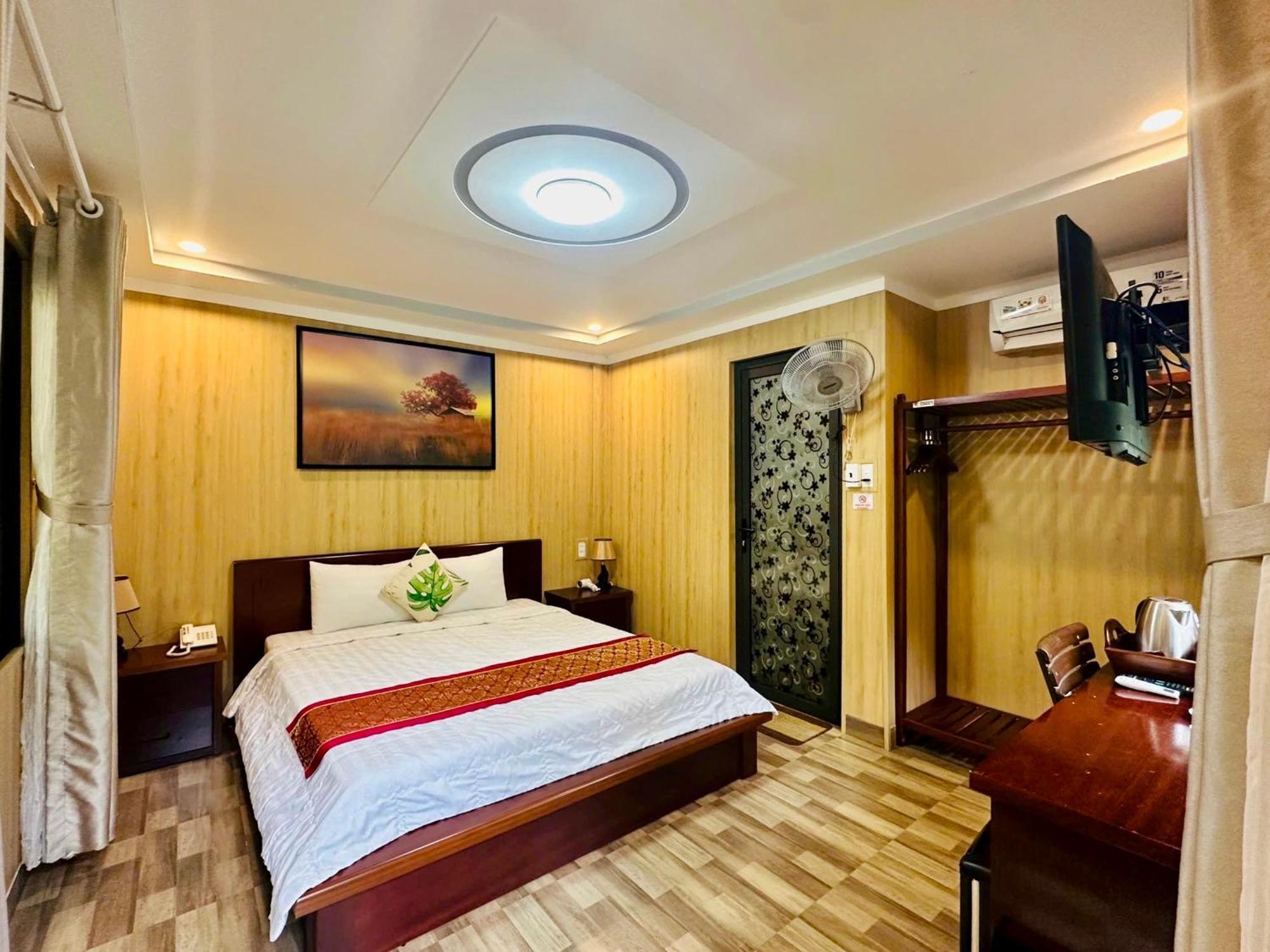 Bazan Home - Hotel & Bungalow Pleiku Rum bild
