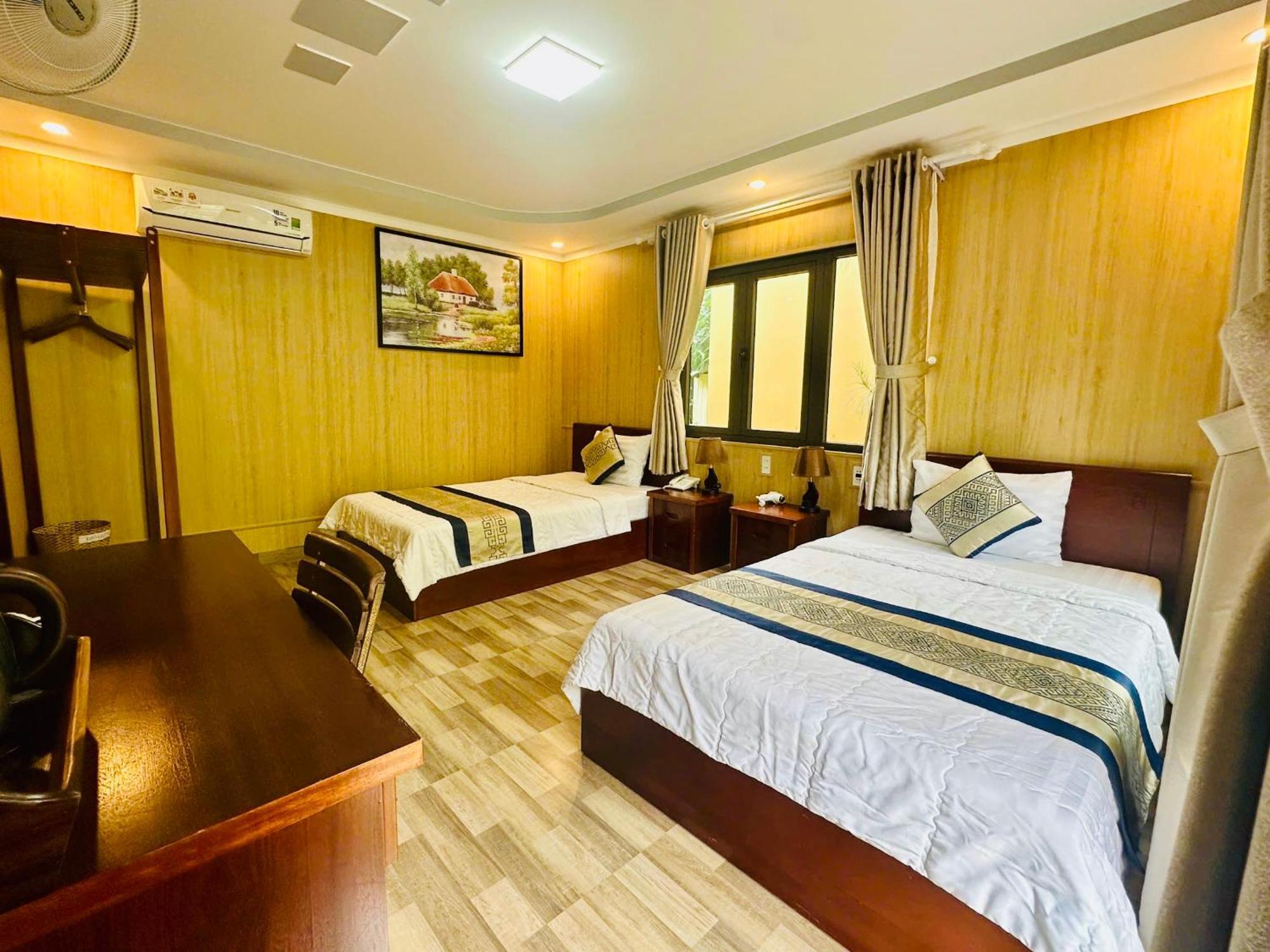 Bazan Home - Hotel & Bungalow Pleiku Rum bild