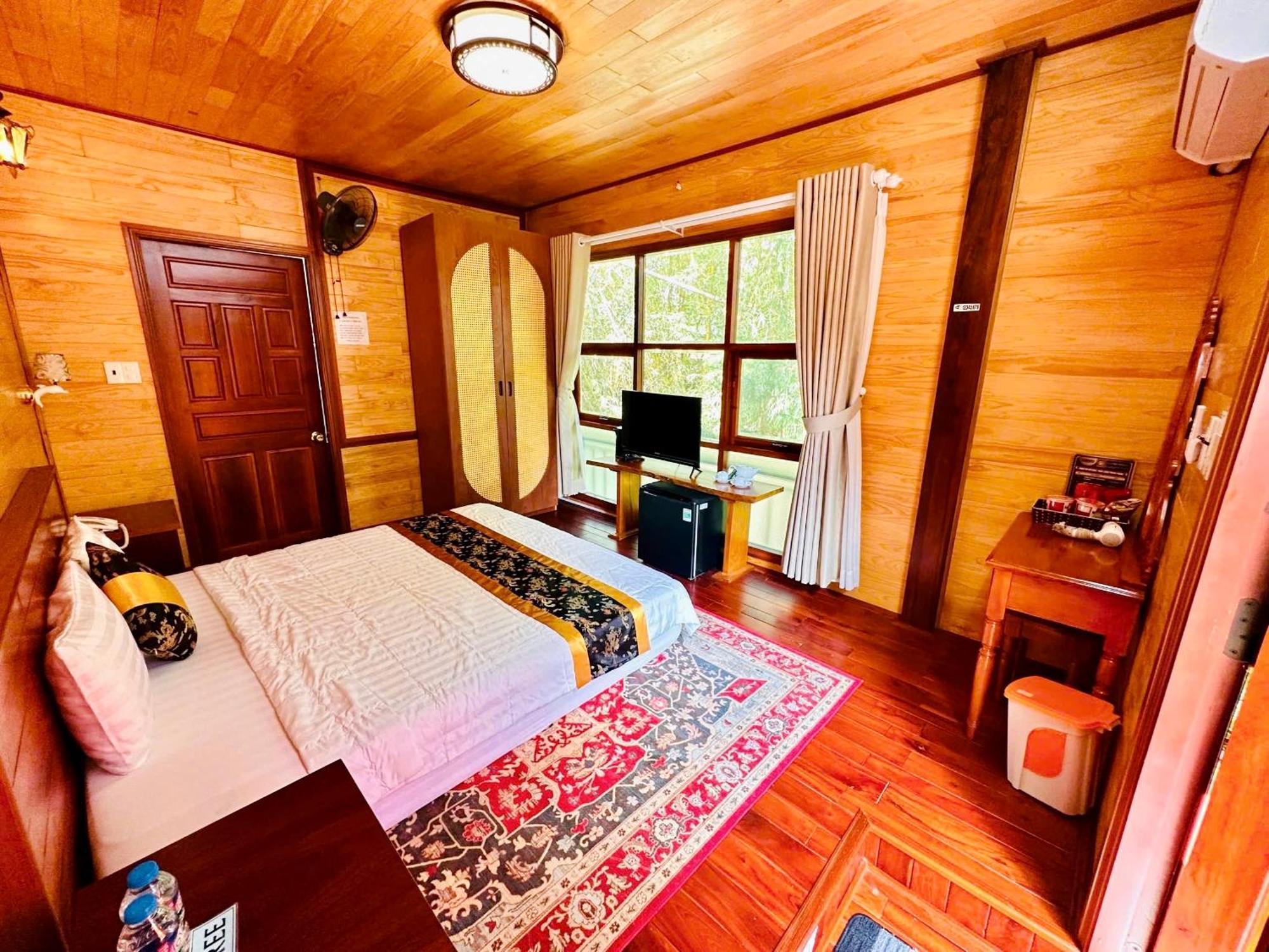 Bazan Home - Hotel & Bungalow Pleiku Rum bild