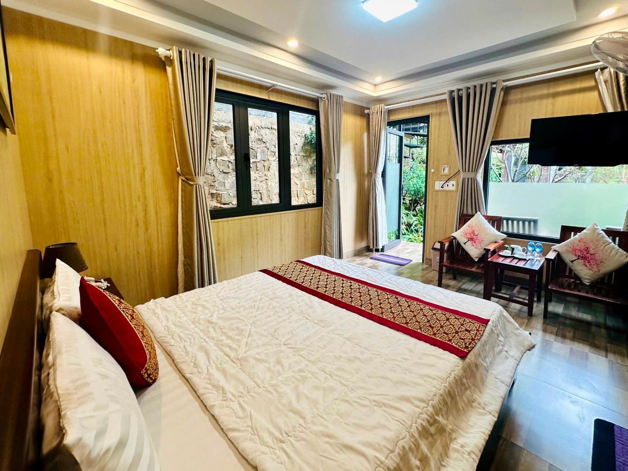Bazan Home - Hotel & Bungalow Pleiku Rum bild